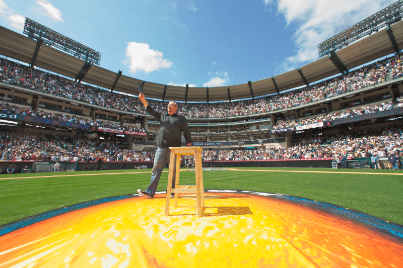 Pastor Rick speaking to a stadium crowd